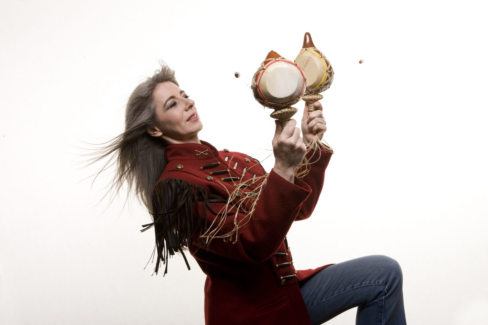 Photograph of Evelyn Glennie playing percussion