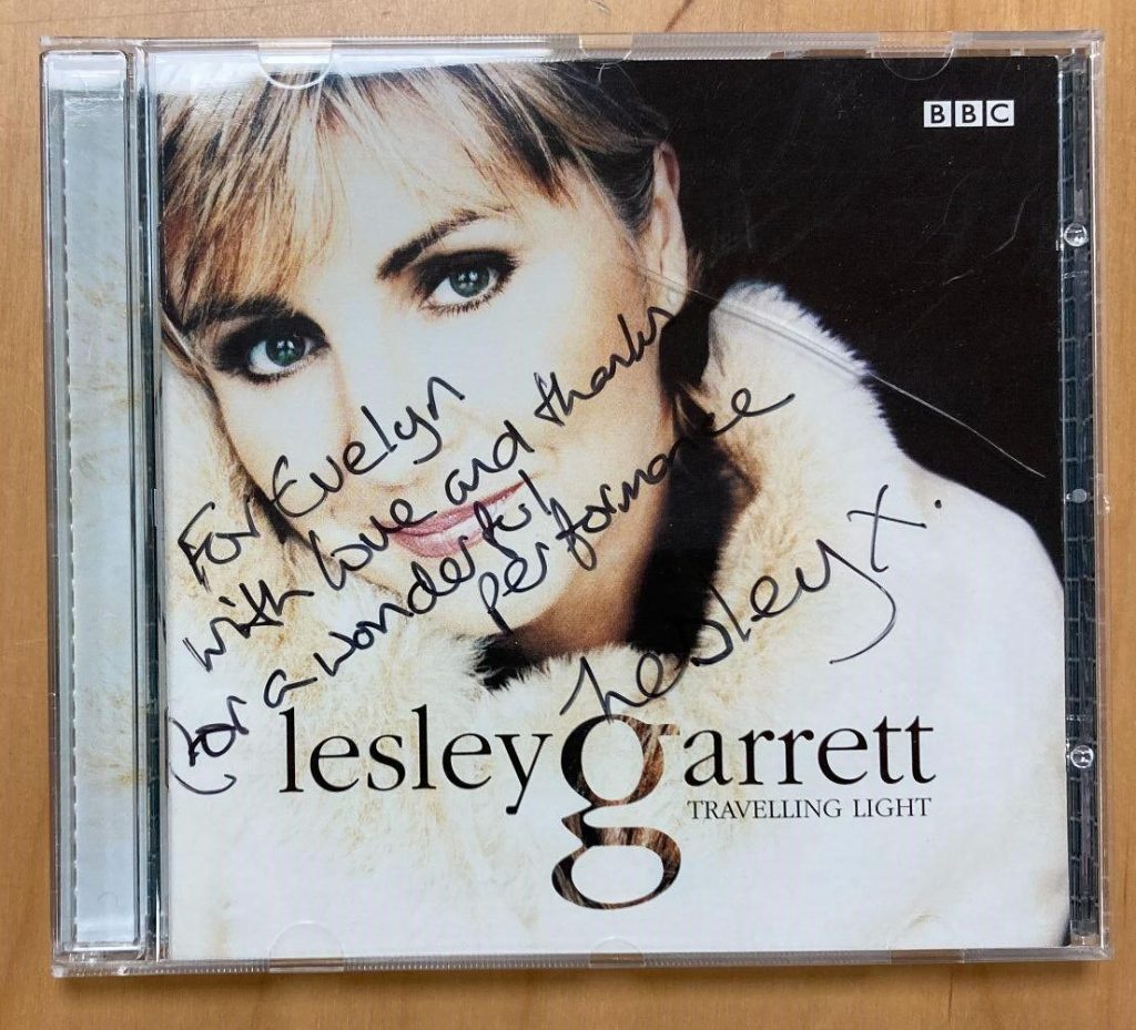 A signed copy of Lesley Garrett's 'Travelling Light' album. The inscription reads 'For Evelyn, with love and thanks for a wonderful performance, Lesley X'