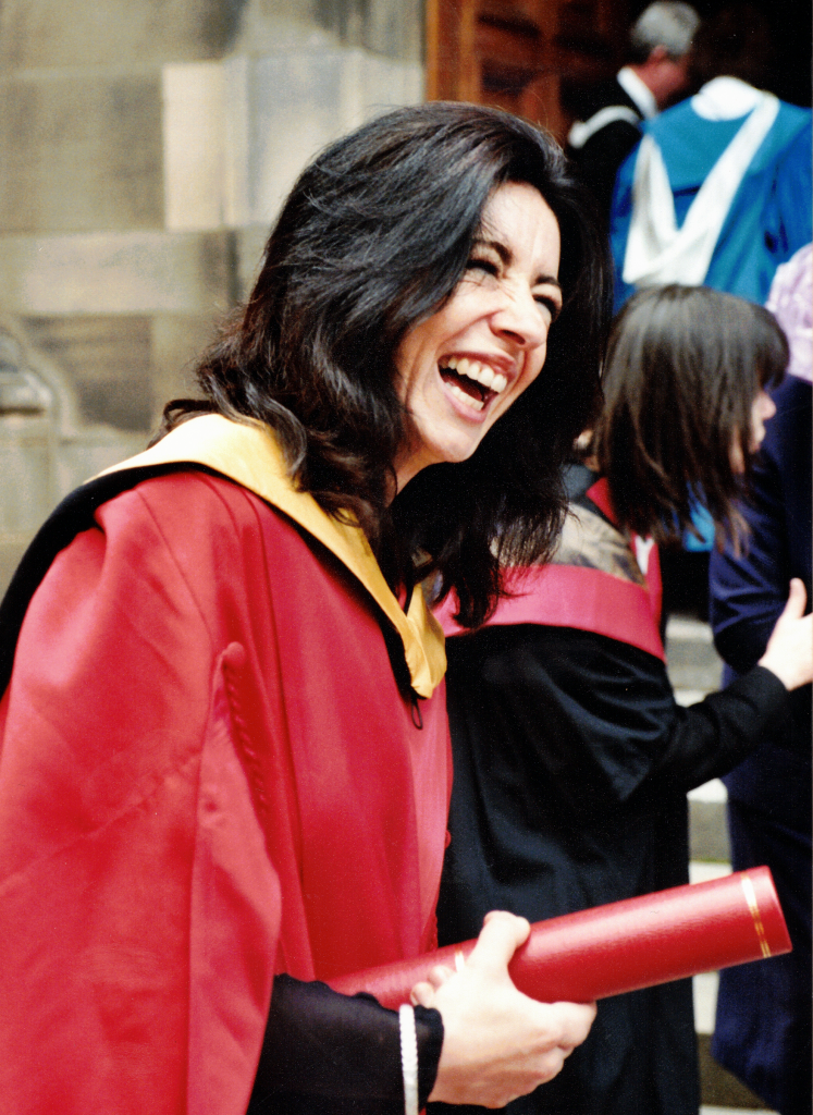 A colour photo of Evelyn getting a degree in July 2004