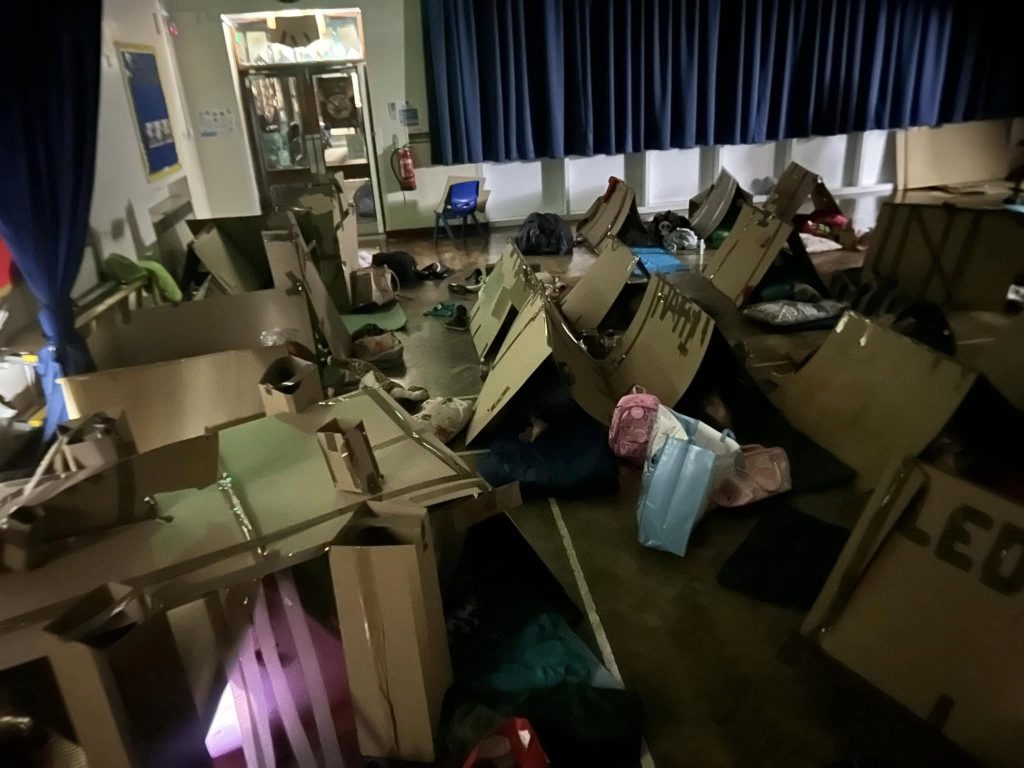 The Scouts slept soundly in their boxes