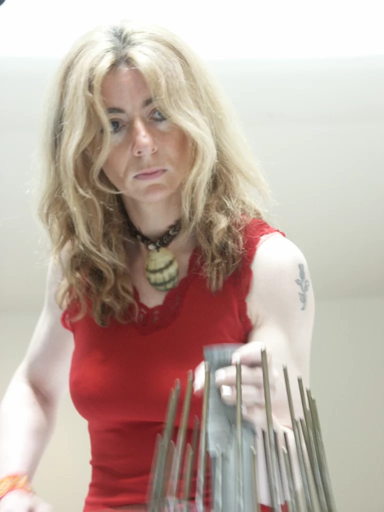 Touch the Sound - Evelyn playing a waterphone in the Guggenheim Museum, New York