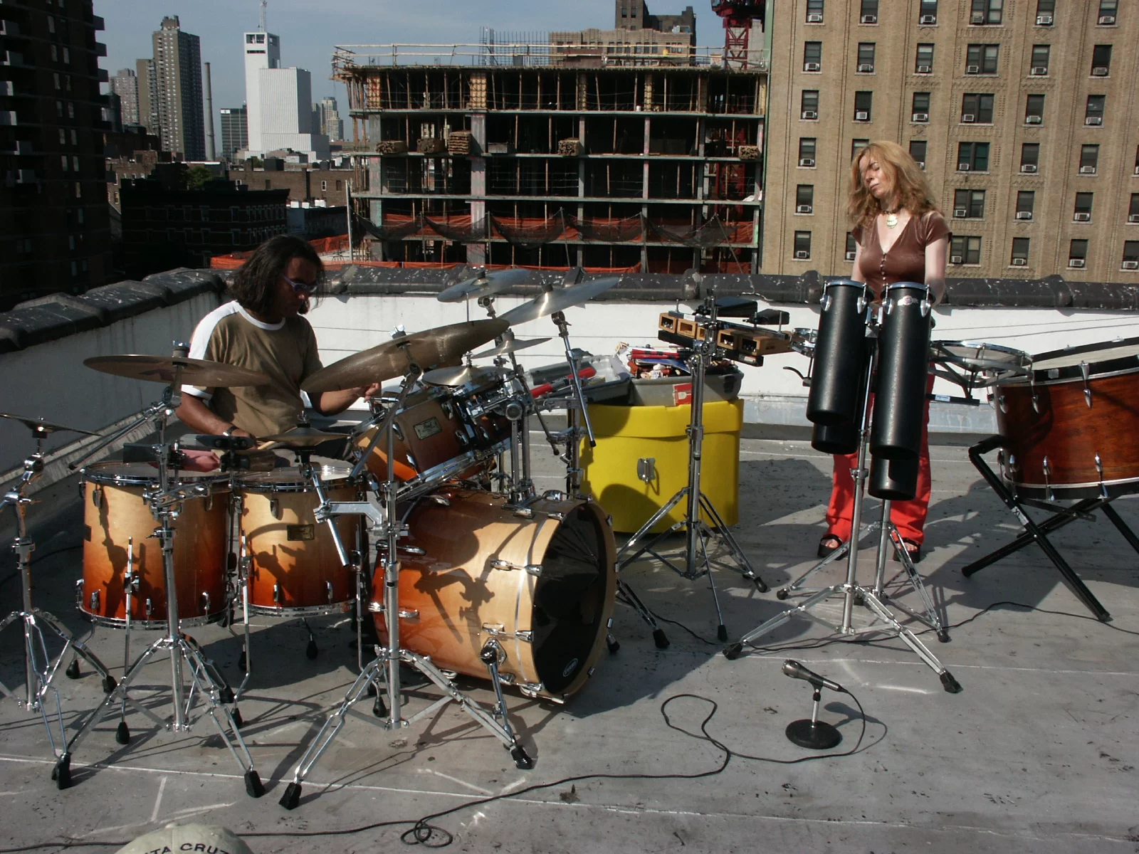 Evelyn sharing a New York roof-top with Horacio “El Negro” Hernandez